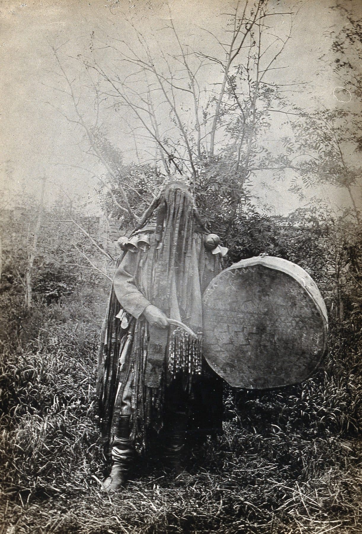 A shaman in ceremonial dress, Minusinsk, Siberia